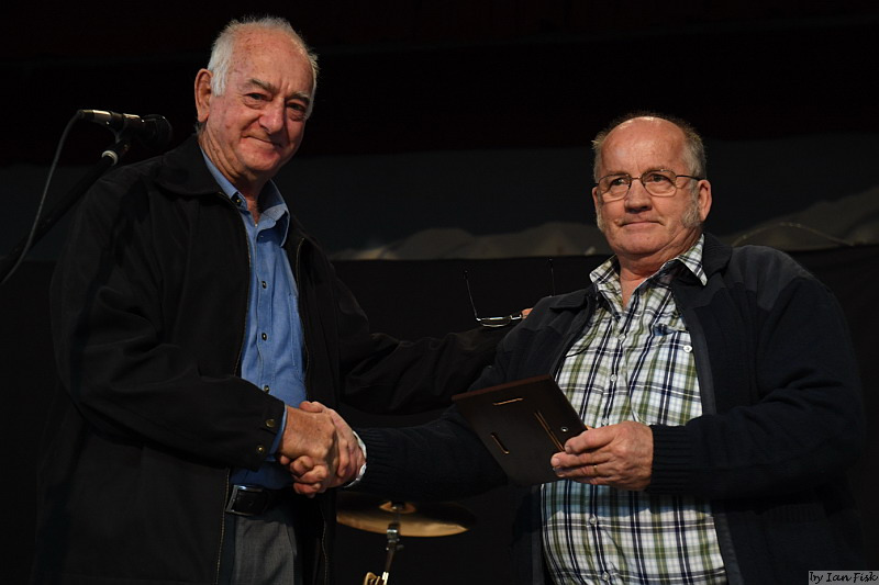Keith Warren accepting the Club's Industry Award from President Dean Beviss